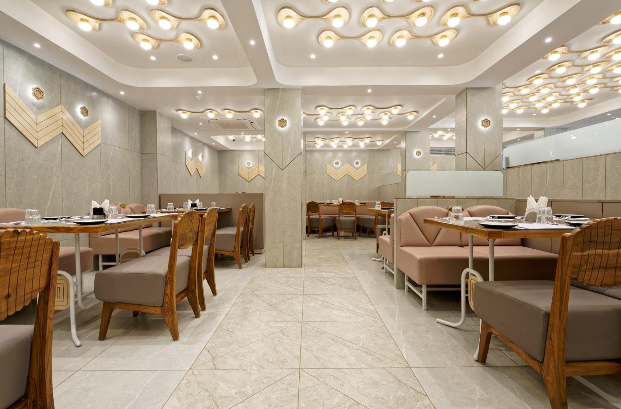 Exora Inn 阿穆达巴 外观 照片