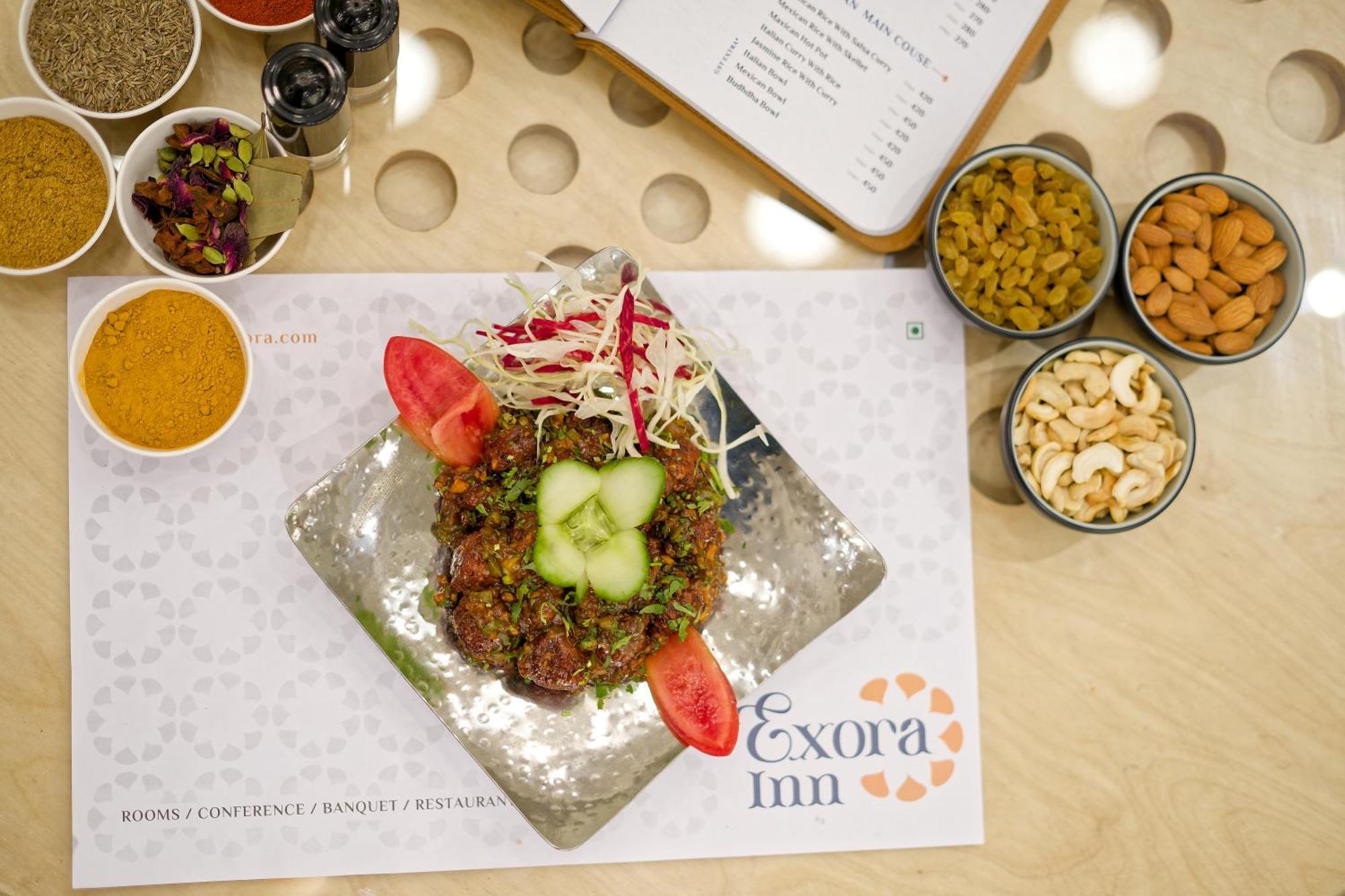 Exora Inn 阿穆达巴 外观 照片