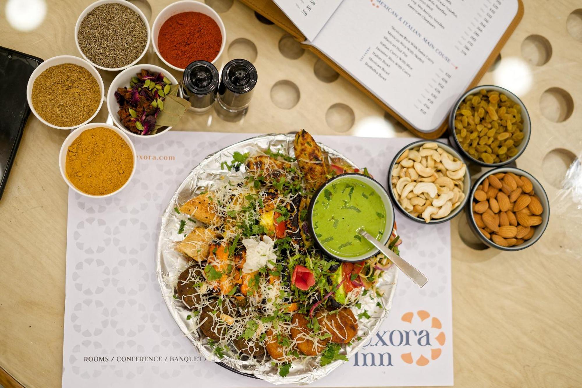 Exora Inn 阿穆达巴 外观 照片