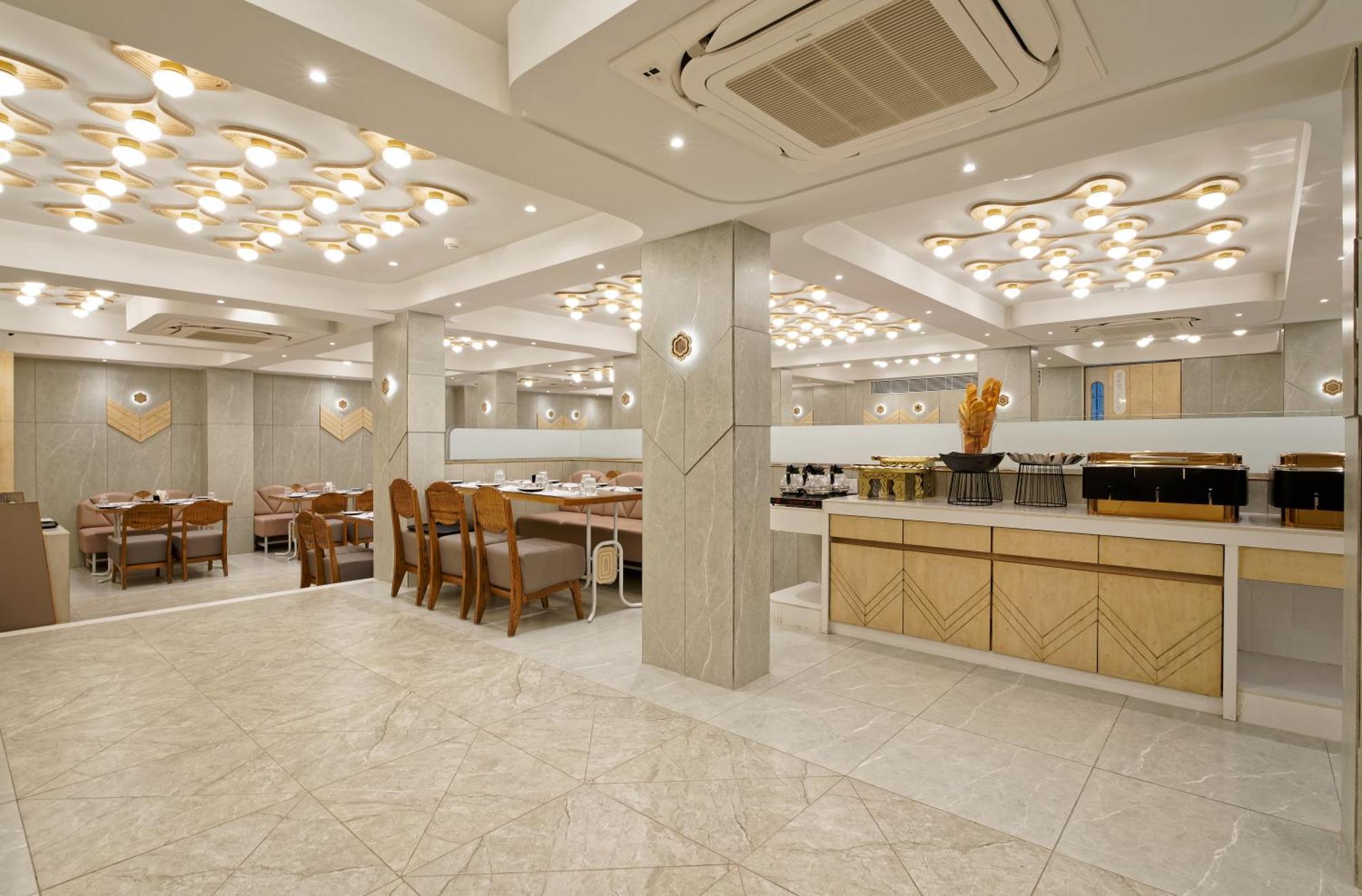 Exora Inn 阿穆达巴 外观 照片