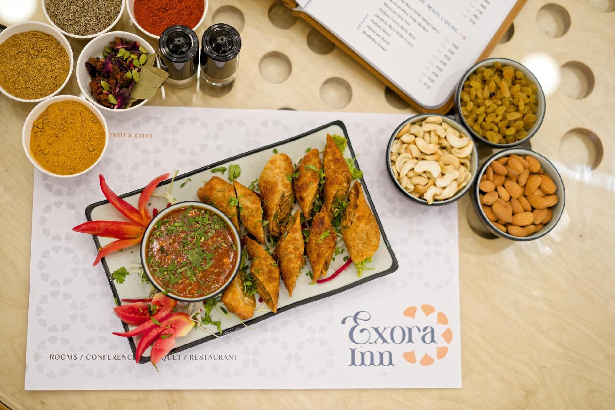 Exora Inn 阿穆达巴 外观 照片