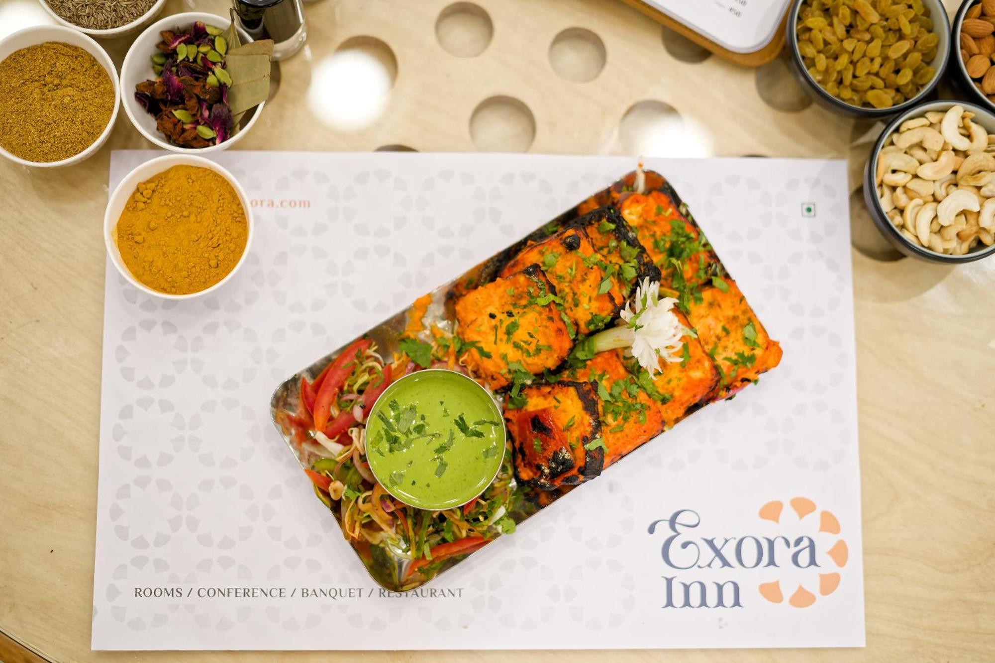 Exora Inn 阿穆达巴 外观 照片