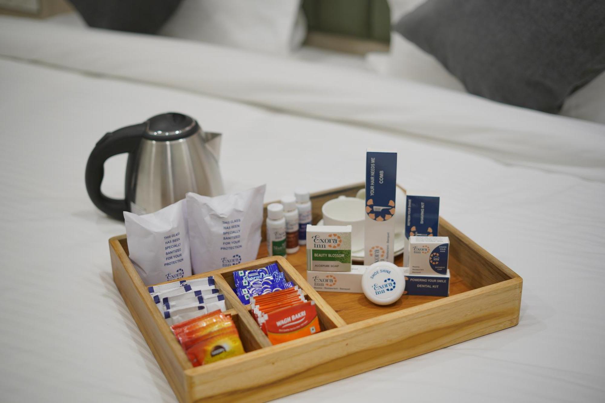 Exora Inn 阿穆达巴 外观 照片