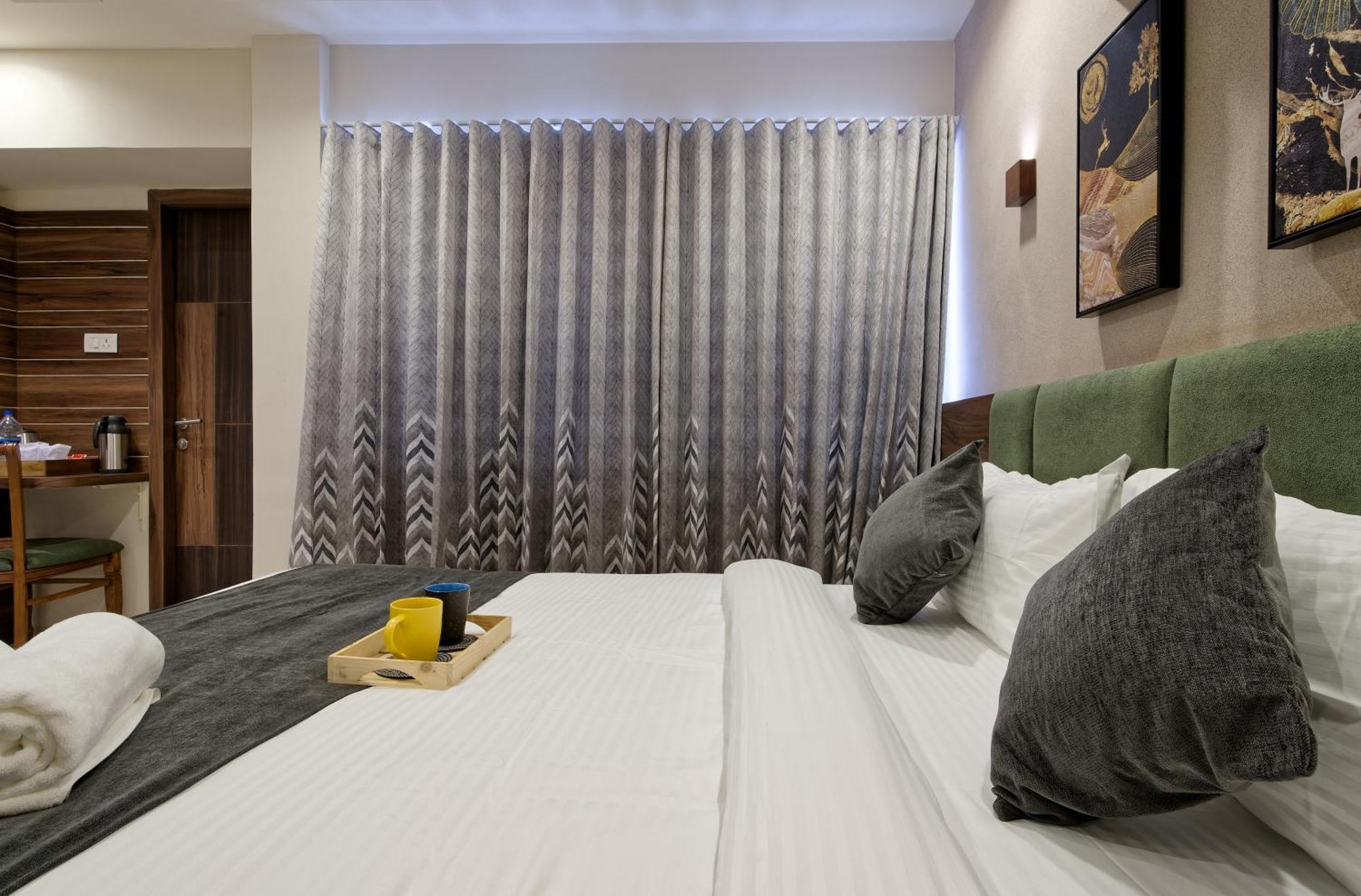 Exora Inn 阿穆达巴 外观 照片