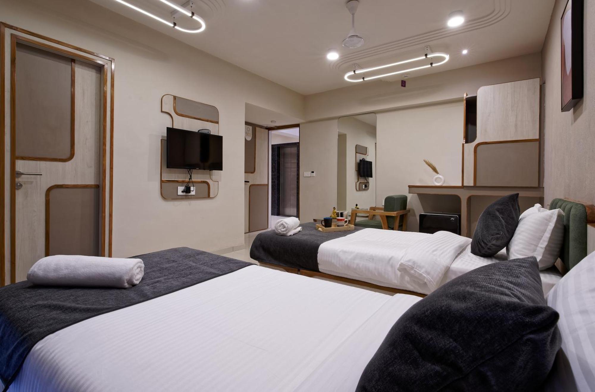 Exora Inn 阿穆达巴 外观 照片