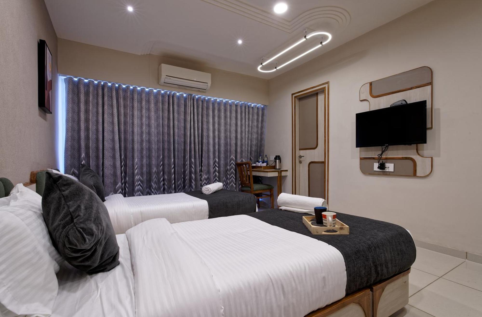 Exora Inn 阿穆达巴 外观 照片