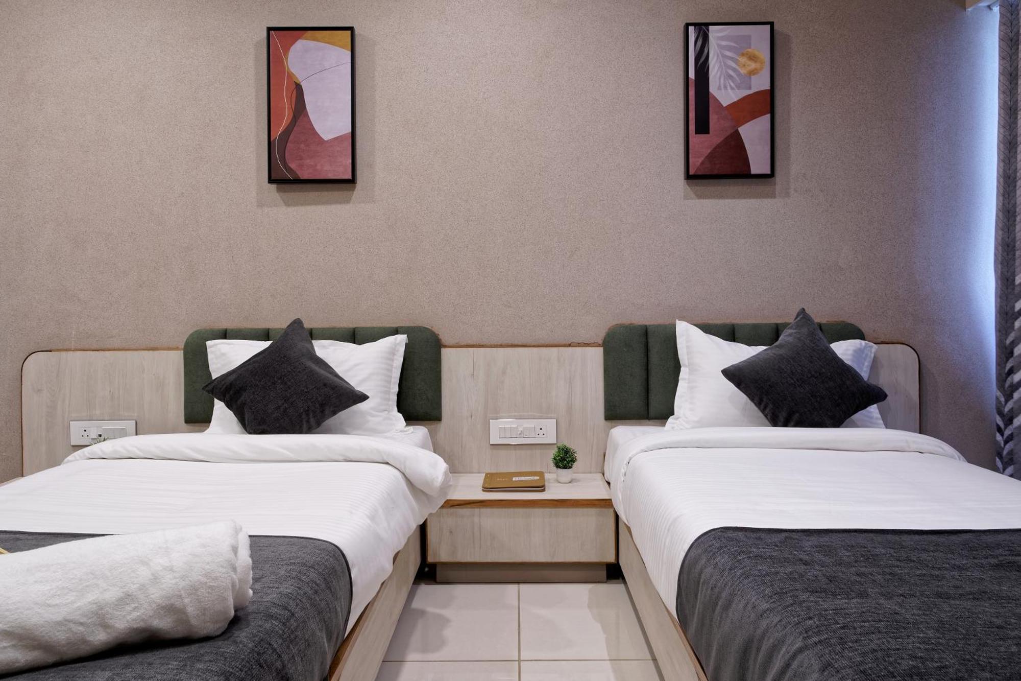Exora Inn 阿穆达巴 外观 照片