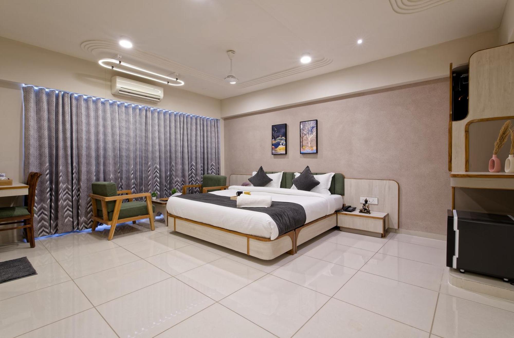 Exora Inn 阿穆达巴 外观 照片