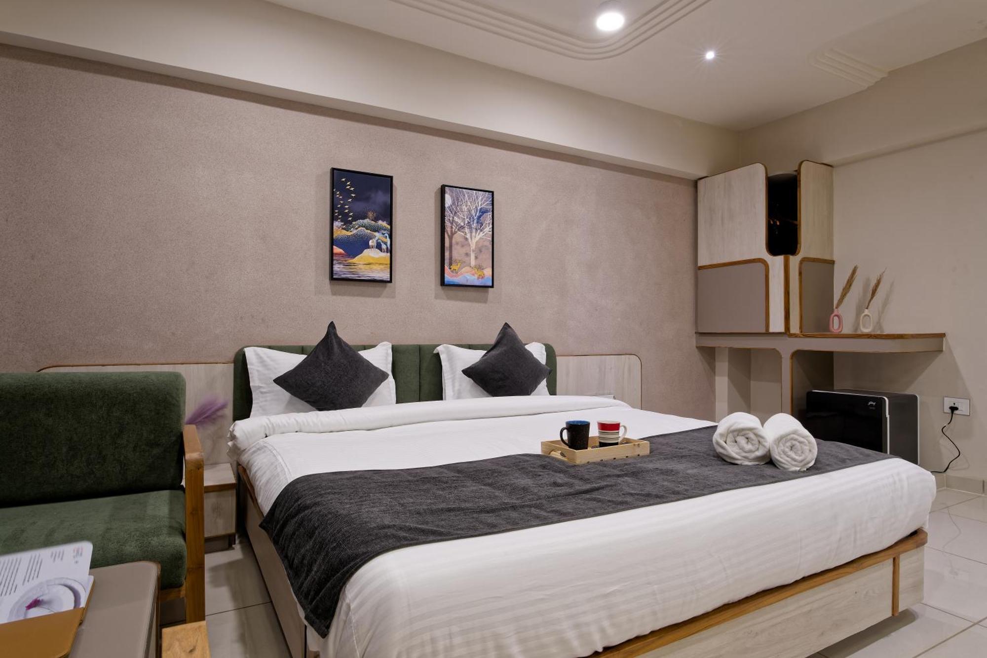 Exora Inn 阿穆达巴 外观 照片