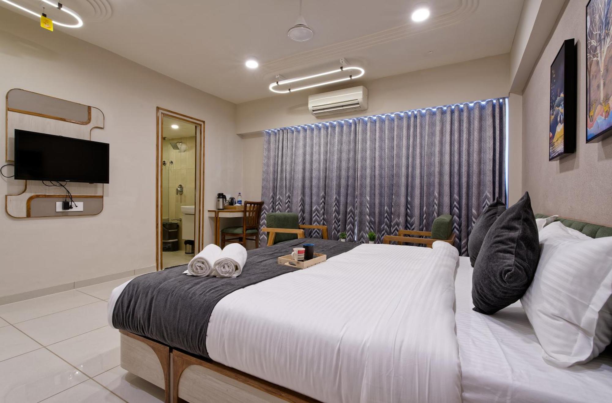 Exora Inn 阿穆达巴 外观 照片