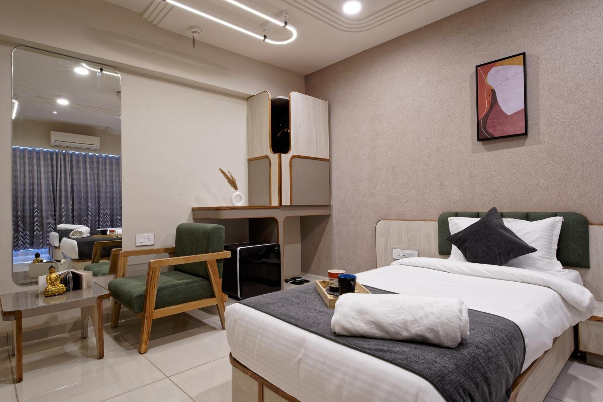 Exora Inn 阿穆达巴 外观 照片